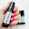 Nix Nausea rollerball ingredient benefits — showcasing peppermint, ginger, fennel, and citrus oils used to ease nausea.